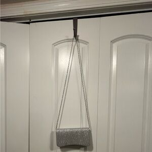 Elegant Silver Clutch with Convertible Chain Strap